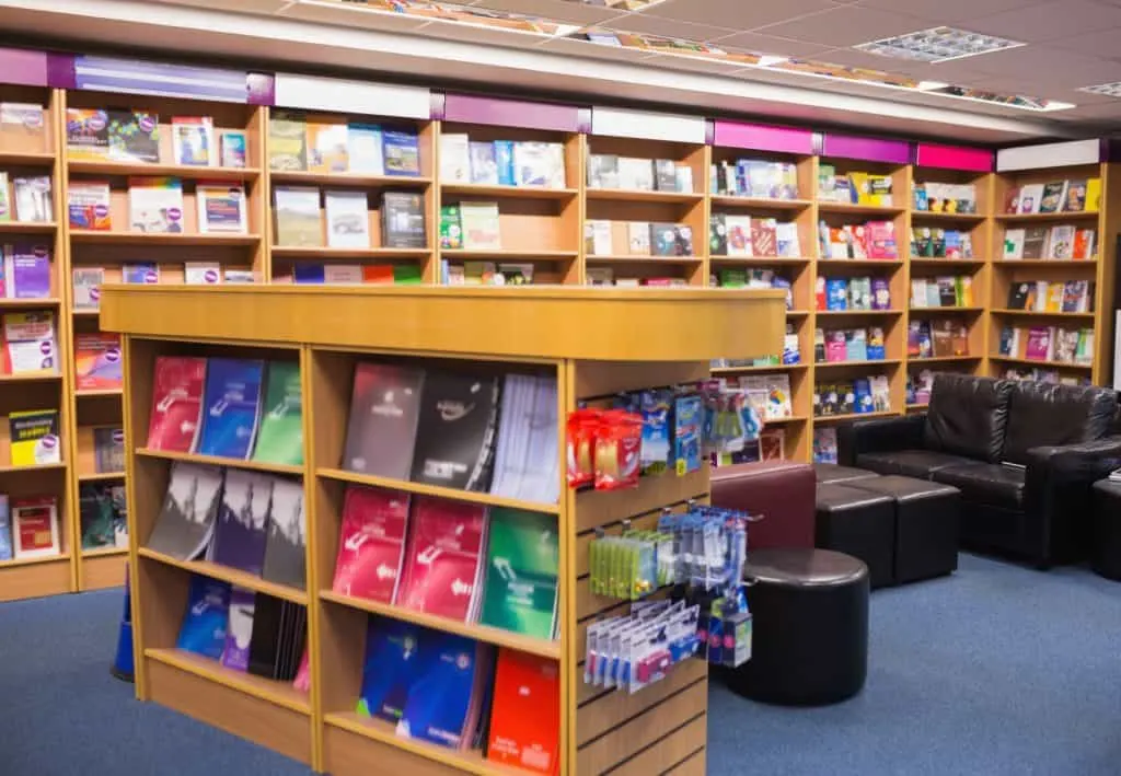 Colourful poetry bookshelves in a quaint bookstore, inviting readers to explore diverse poetry collections.